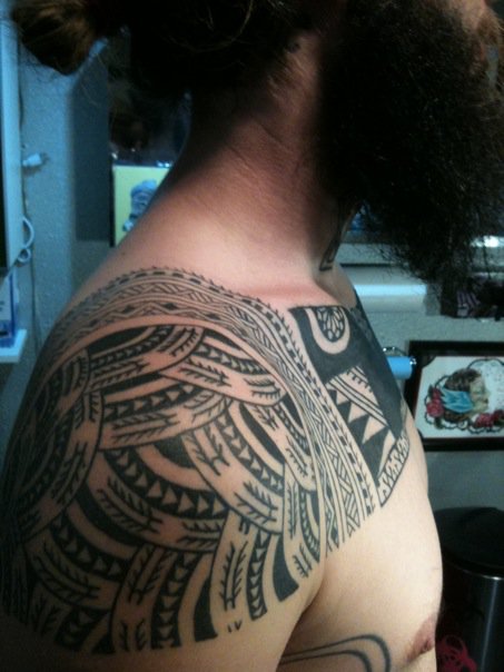 Mixed Polynesian Arm and Chest Tattoo by Dave Rodriguez